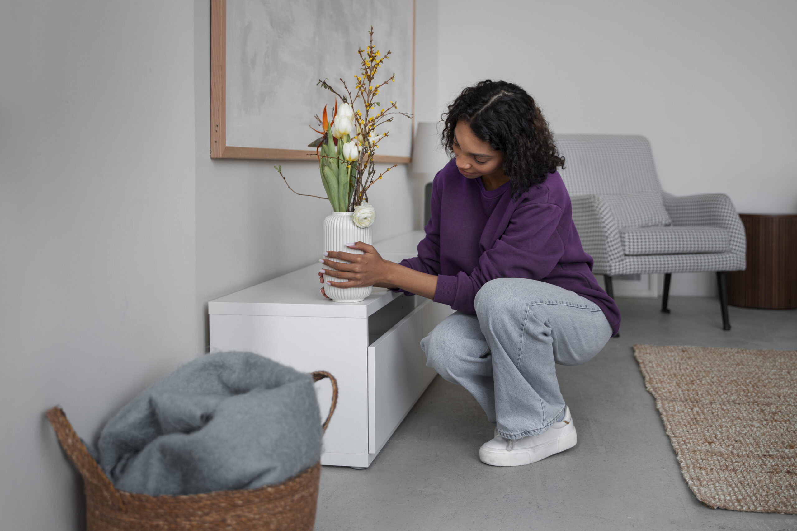 A-small-warm-room-styled-with-handmade-decor-thrifted-furniture-and-cozy-lighting-on-a-budget.