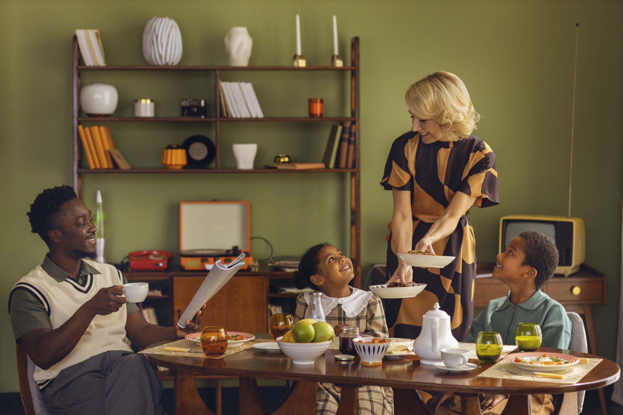 Old-style living room birthday-setup-(simple-balloons-rice/cake-table-feel