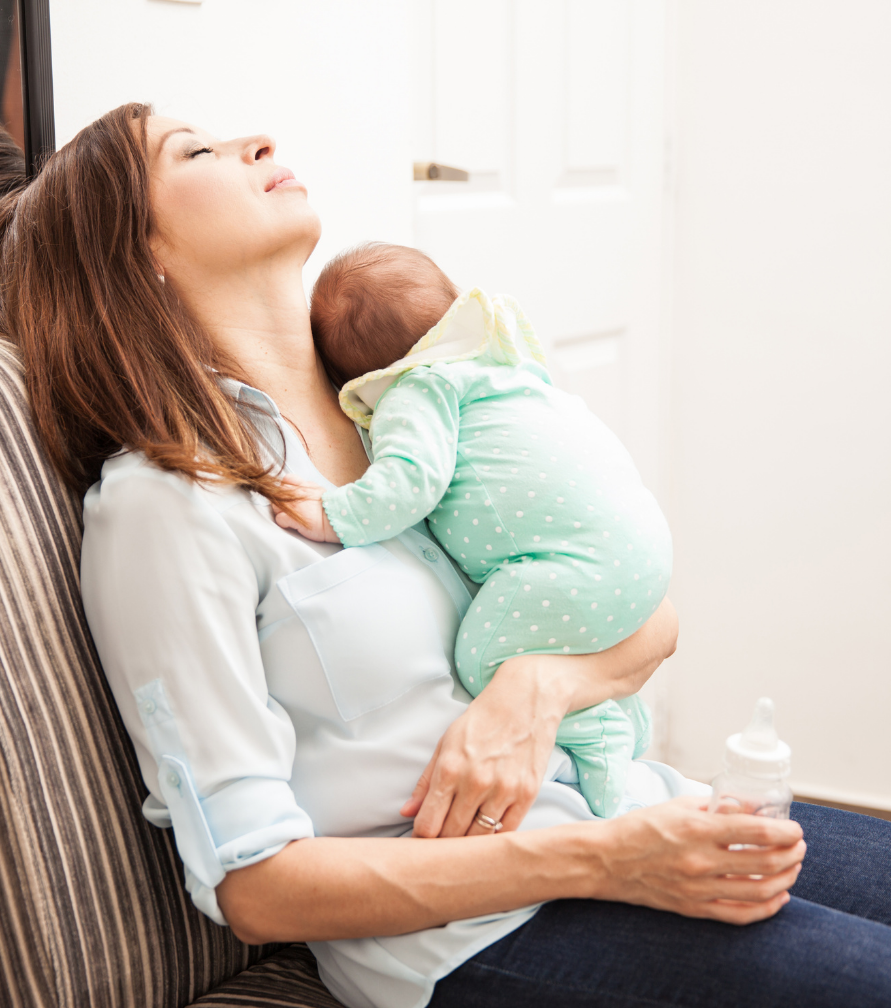 newborn-baby-routine-mother-holding-newborn-baby-overwhelmed-mom