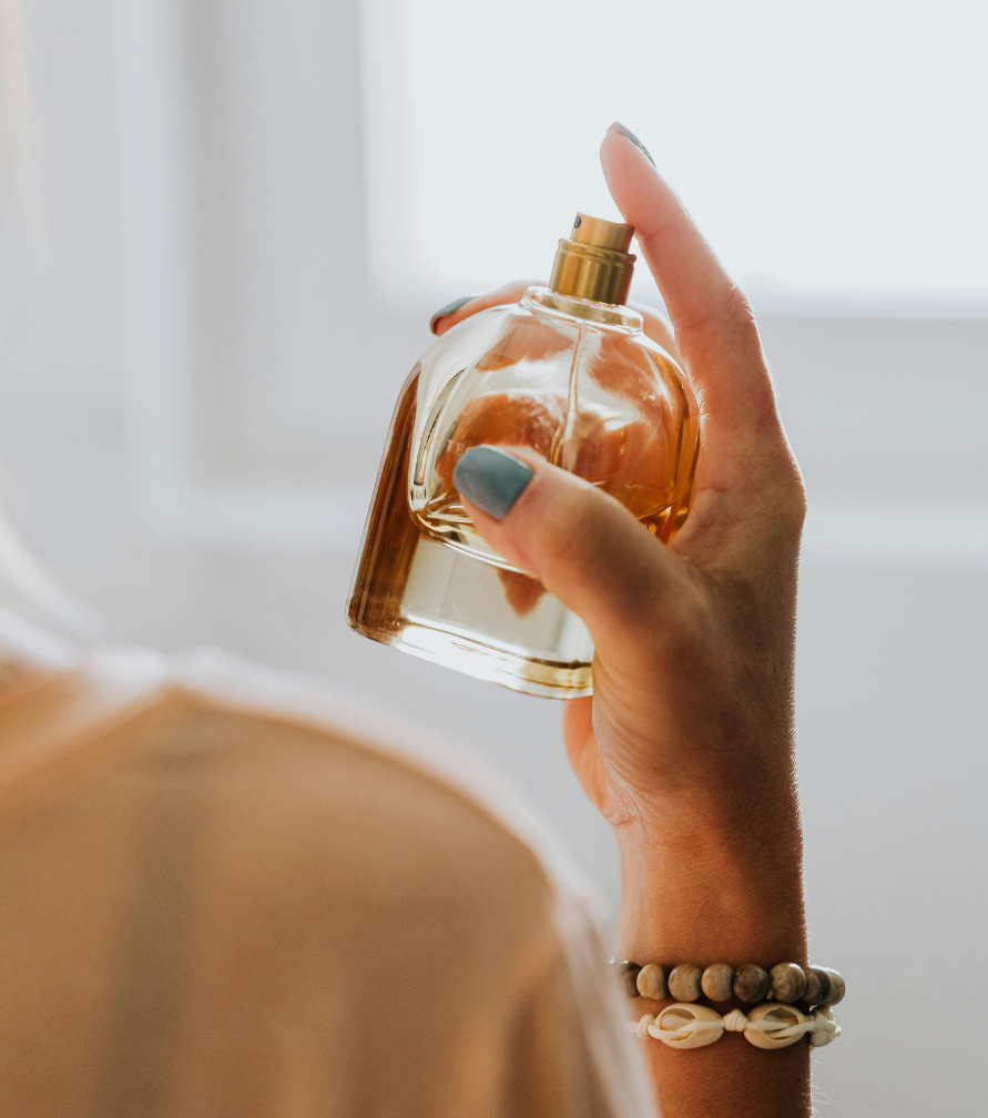 mom-essentials-for-busy-moms-daily-items-water-bottle-lip-balm-fragrance-diaper-bag